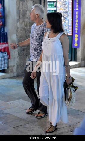 U2's The Edge aka David Howell Evans and his wife Morleigh Steinberg go sightseeing in Dubrovnik, Croatia's old town and are joined by fellow U2 star Adam Clayton and his wife Mariana Teixeira De Carvalho. They are also accompanied by The Edge's daughter Stock Photo