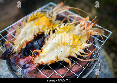 shrimp grilled on the flaming grill Stock Photo