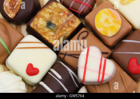 Background made of assorted chocolates and pralines Stock Photo