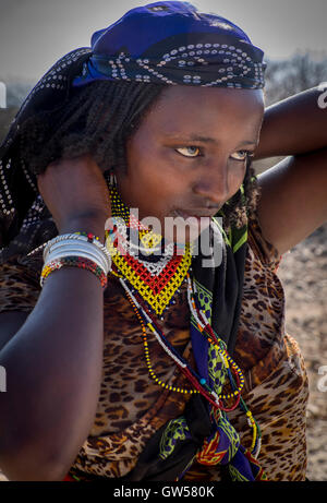 Young Ethiopian beauty walking in the desert of southern Ethiopia Stock Photo
