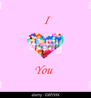 I Love You on pink with red script and multicolor heart. Valentine concept Stock Photo