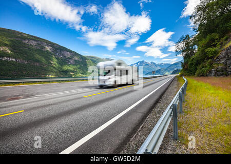 Caravan car travels on the highway. Caravan Car in motion blur. Stock Photo