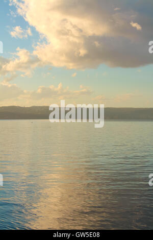 Beginning of a sunset on the lake. Stock Photo