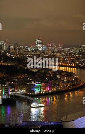 Night view of Nelson Dock Pier, Columbia Wharf and the River Thames from Marsh Wall, Canary Wharf, London, UK, E14 Stock Photo