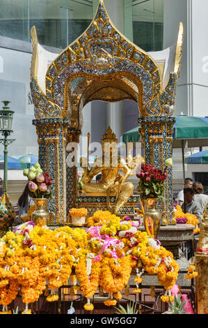 The Phra Phrom gold image at the Erawan Shrine in Bangkok, Thailand Stock Photo