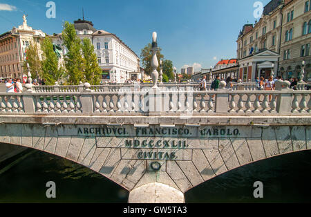 Ljubljana, Slovenia - September 2, 2016 People walking on Triple bridge, Ljubljana, Slovenia Stock Photo