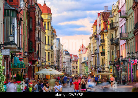 Torun, Poland - July 06: Crowded pedestrian street on a summer evening in the old town of Torun (Thorn), Poland on July 06, 2015 Stock Photo
