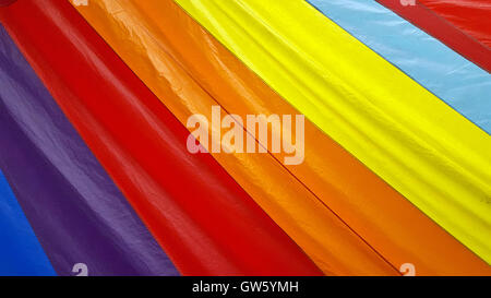bold rainbow stripes on sailboat spinnaker Stock Photo