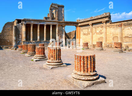 Ruins of antique roman temple in Pompeii, destroyed by eruption of Mount Vesuvius volcano in 79 AD, Naples, Italy Stock Photo