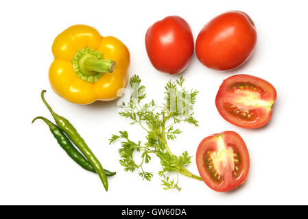 Top View of Yellow Bell Pepper,Tomato,Chili And Cilantro Stock Photo