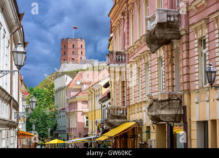 The Pilies Street, main pedestrian street in Vilnius Old Town, with view to Gediminas Tower, Lithuania Stock Photo