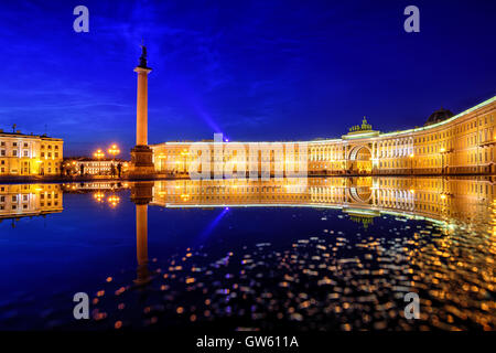 General Staff building and Alexander Column reflecting in rain water on Palace Square in St Petersburg, Russia, on white summer Stock Photo