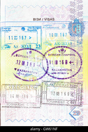 Ukrainian passport with stamps of Kyrgyzstan, Kazakhstan, Uzbekistan Stock Photo