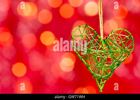heart from metal on the red background Stock Photo