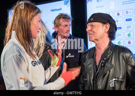 Rio de Janeiro, Brazil. 11th Sep, 2016. German singer Klaus Meine of the hard rock band Scorpions talk with Paralympics cycling athletes, Denise Schindler of Germany, at a meeting in the German House during the Rio 2016 Paralympic Games, Rio de Janeiro, Brazil, 11 September 2016. Photo: Jens Buettner/dpa Credit:  dpa picture alliance/Alamy Live News Stock Photo