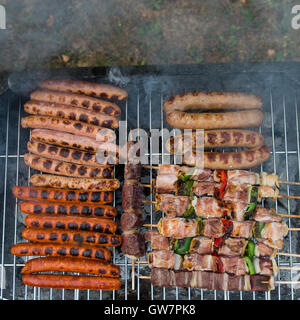 Barbecue grill with various kinds of meat, close-up. Stock Photo