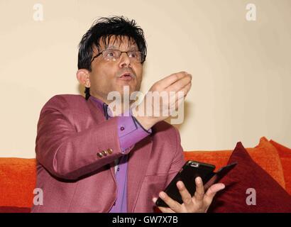 Bollywood actor filmmaker Kamaal Rashid Khan press conference telephonic conversation filmmaker Kumar Mangat Pathak Mumbai Stock Photo