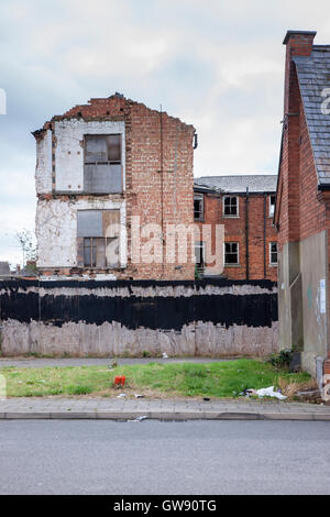 Edmund's Hospital site Northampton being demolished and the land rebuilt on, frontage of the old hospital has to remain. Stock Photo