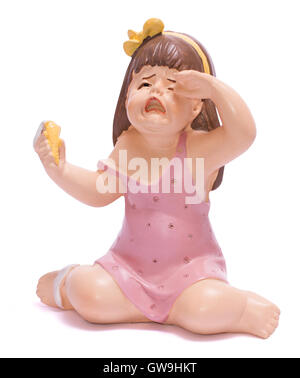 Isolated Small Statue of a Crying Baby Girl with a Droped Ice-Cream ...