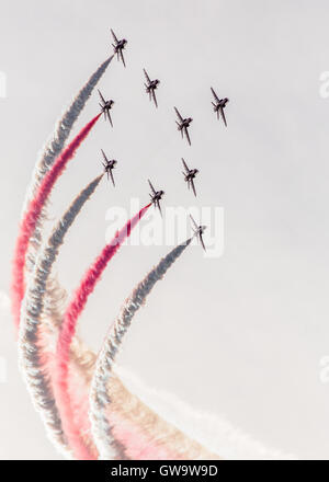 The Red Arrows aerobatics display team (or Royal Air Force Aerobatic Team) performing at Chatsworth Park on 4th September. Stock Photo
