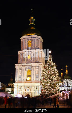 St. Sophia Cathedral, Christmas market, and main Kyiv's New Year tree on Sophia Square in Kyiv, Ukraine Stock Photo