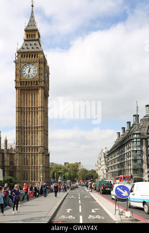 The new segregated cycle lane on Westminster Bridge, London, UK. Shows Big Ben and Portcullis House beyond Stock Photo