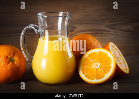 pitcher and a glass of orange juice Stock Photo - Alamy