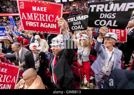 Cleveland, Ohio, USA, 20th July 2016 West Virgina delegates to the Republican National convention some of whom are coal miners now out of work show their support for Donald Trump by waving signs saying Trump digs coal  Credit: Mark Reinstein Stock Photo