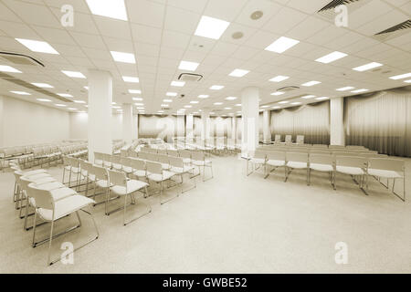 large and modern white auditorium with curtains Stock Photo