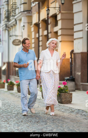 Mature couple holding hands. Stock Photo