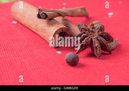 Ingredients for mulled wine on a red napkin Stock Photo