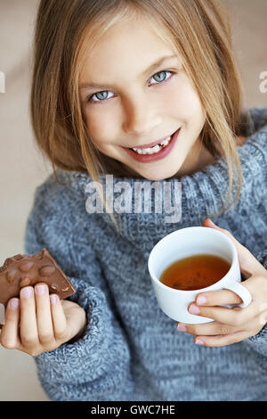 Child drinking tea Stock Photo