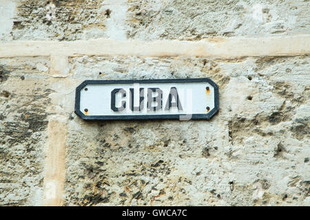 street sign stating Cuba, on brick wall, Havana, Cuba Stock Photo