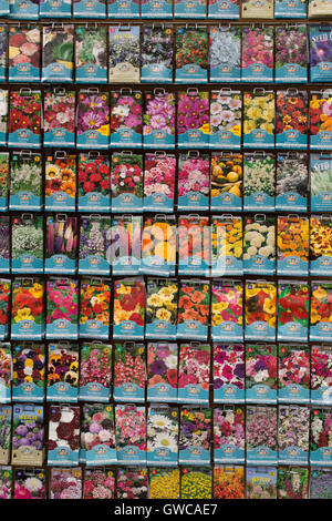 Flower seed packets for sale in a garden centre. UK Stock Photo