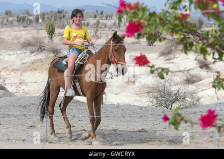 Riding in the desert tatacoa; The Tatacoa Desert is an arid area located in the department of Huila in the municipality of Villa Stock Photo