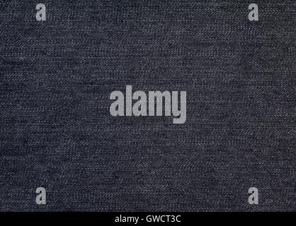 Deep black denim jeans fabric jeans background Stock Photo