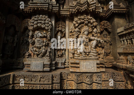 Shrine wall relief sculpture follows a stellate plan in the Chennakesava temple at Somanathapura,Varaha,India,Asia,Karnataka. Stock Photo