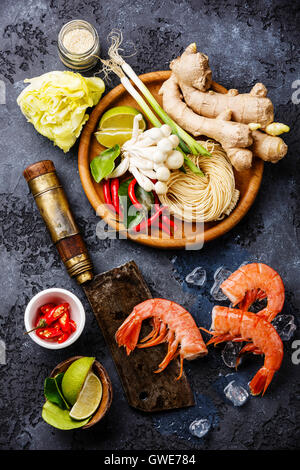 Raw ingredients for asian spicy Ramen noodles with Prawns Stock Photo