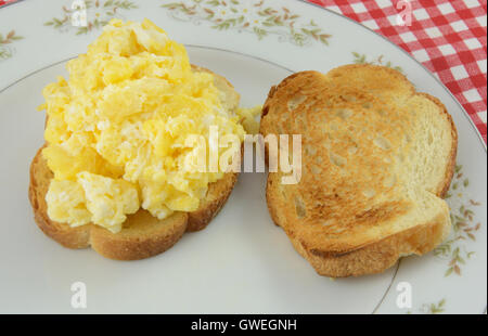 Scrambled egg sandwich on plate Stock Photo