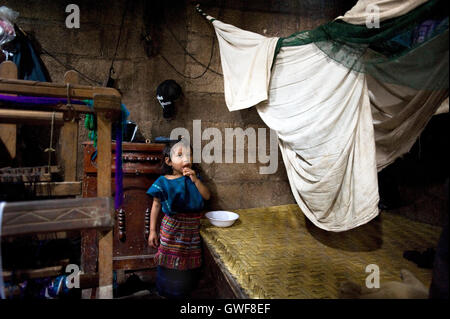 A maya indigenous girl at home in San Antonio Palopo, Solola, Guatemala. Stock Photo