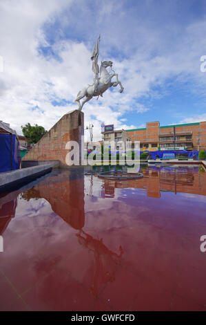 TULCAN, ECUADOR - JULY 3, 2016: el libertador monument is located in the middle of a fountain in ayora park Stock Photo