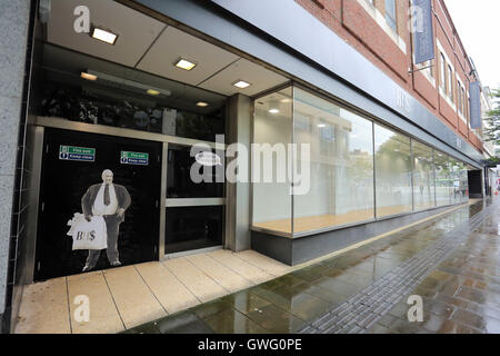 Swansea, UK. 13 September 2016 A poster of Sir Philip Green on the door of the now closed down BHS store in Oxford Street, Swansea, Wales, UK.  Re: Former owner of BHS, Sir Philip Green has paid a surprise 'visit' to the closed down BHS store in Swansea. He was spotted in the doorway of the Oxford Street store, which closed its doors for the last time last month. In his hand was a BHS shopping bag with money spilling out of it. Sir Philip had owned BHS before selling it for £1 last year. Credit:  D Legakis/Alamy Live News Stock Photo
