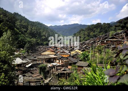 China. 14th Sep, 2016. Guizhou, CHINA-September 1 2016: (EDITORIAL USE ONLY. CHINA OUT) .Traditional village of Dong minority group in Congjiang County, southwest ChinaÂ¡Â¯s Guizhou Province. Dong ethnic minority people are traditionally live on rice with skilled cultivating on famous terraces. It is also an ethnic group skilled in wooden architectures with no nails. The unique wooden architectures of inhabited houses and drum towers are the main features of Dong Minority. A typical Dong house is a three-storey one built on wood pillars; people live in the second floor, and the third fl Stock Photo