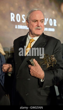 Berlin, Germany. 13th Sep, 2016. Actor John Cleese holding the Rose d'Or trophy for lifetime achievement in Berlin, Germany, 13 September 2016. PHOTO: JOERG CARSTENSEN/dpa/Alamy Live News Stock Photo