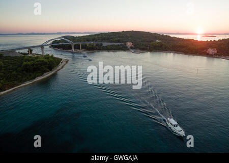 Mali Zdrelac bridge connecting Ugljan and Pasman islands during sunset Stock Photo