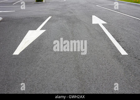 lane arrows on tarmac Stock Photo