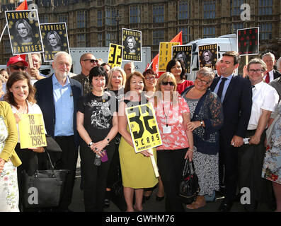 Labour leader Jeremy Corbyn (second left) and shadow home secretary Andy Burnham (second right) attend a rally for the Orgreave Truth and Justice Campaign (OTJC) outside the Houses of Parliament in London. Stock Photo