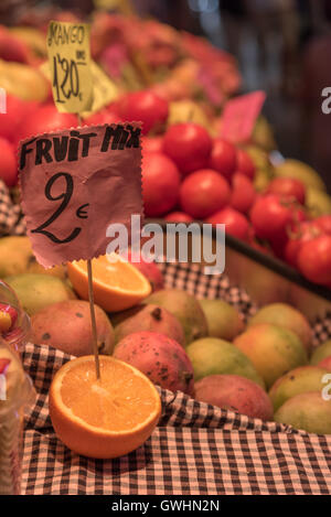 A walk around the market is a feast for all the senses. Freshfruit produce for sale at the Mercado de la Boqueria, Barcelona. Stock Photo