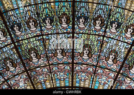The lavish interior of the Palau de la Musica Catalana, with it's ornate stained glass, decorated stonework and creative design. Stock Photo