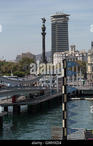 Port Vell, the Rambla de Mar bridge and the Columbus Monument all seen from the second floor of the Maremagnum shopping Centre. Stock Photo
